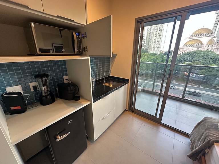 Paraíso: Studio com varanda e vista incrível 408